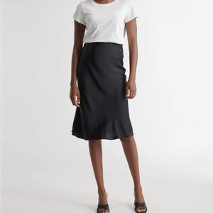 Quince washable silk skirt in black.